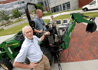 Dr. Wayne Book with student demonstrating research. Dr. Wayne Book with student demonstrating research.