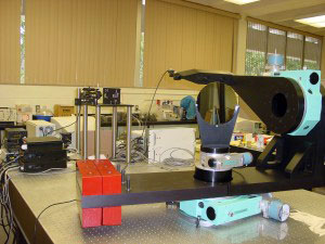 A three-axis goniometric table for measuring the bidirectional reflectance of silicon wafers. A three-axis goniometric table for measuring the bidirectional reflectance of silicon wafers.